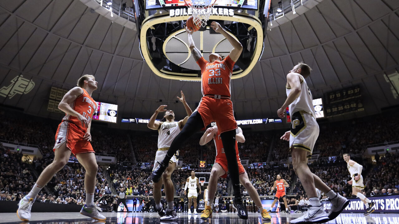 WEST LAFAYETTE, INDIANA - JANUARY 05: Coleman Hawkins #33 of the Illinois Fighting Illini rebounds the ball in the game against the Purdue Boilermakers at Mackey Arena on January 05, 2024 in West Lafayette, Indiana.