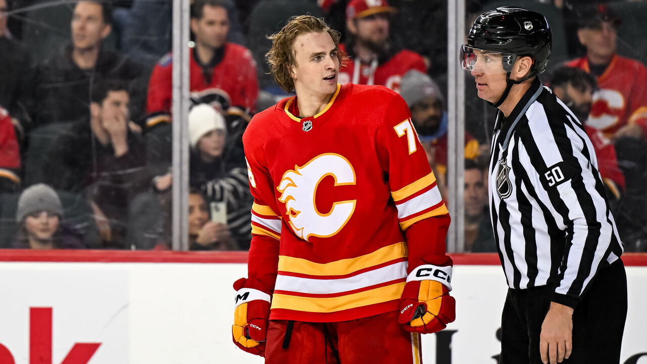 CALGARY, AB - MARCH 04: Calgary Flames Right Wing Martin Pospisil (76) reacts after roughing after a whistle during the third period of an NHL game between the Calgary Flames and the Seattle Kraken on March 4, 2024, at the Scotiabank Saddledome in Calgary, AB.
