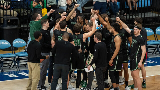 NEW YORK, NEW YORK - FEBRUARY 16: Dartmouth Big Green players huddle during their game against Columbia Lions in their NCAA men's basketball game on February 16, 2024 in New York City. After last week's National Labor Relations Board ruling that Dartmouth's men's basketball players are employees of the school, the team members will vote next month on whether to create the first labor union for NCAA athletes.