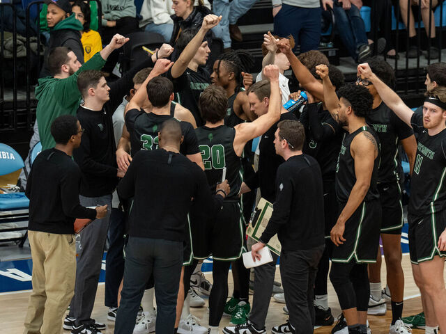 NEW YORK, NEW YORK - FEBRUARY 16: Dartmouth Big Green players huddle during their game against Columbia Lions in their NCAA men's basketball game on February 16, 2024 in New York City. After last week's National Labor Relations Board ruling that Dartmouth's men's basketball players are employees of the school, the team members will vote next month on whether to create the first labor union for NCAA athletes.