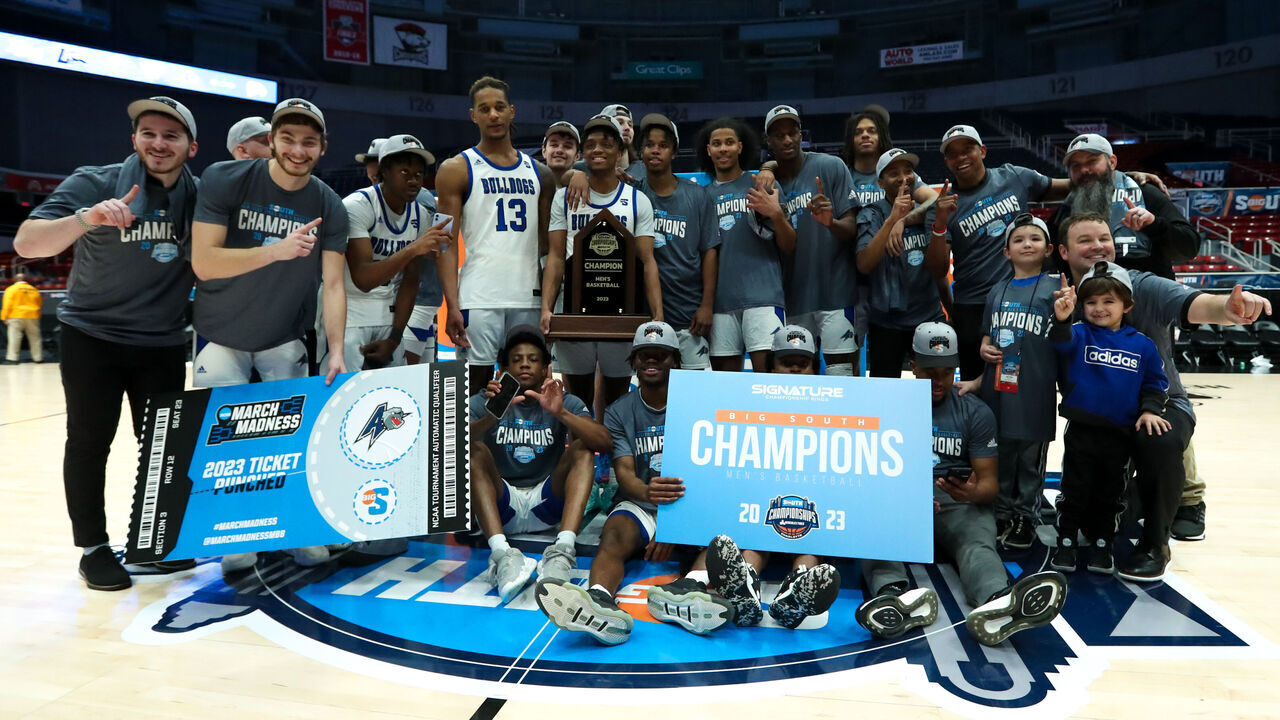 CHARLOTTE, NC - MARCH 05: The North Carolina-Asheville Bulldogs celebrate after winning the Big South Championship against the Campbell Fighting Camels on March 5, 2023 at Bojangles Coliseum in Charlotte, NC.