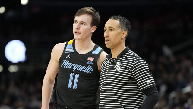 WASHINGTON, DC - FEBRUARY 03: Head coach Shaka Smart of the Marquette Golden Eagles talks with Tyler Kolek #11 in the first half during a college basketball game against the Georgetown Hoyas at the Capital One Arena on February 3, 2024 in Washington, DC.
