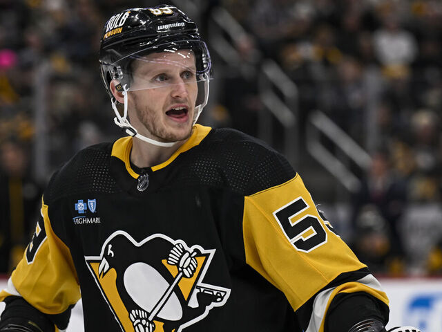 PITTSBURGH, PA - FEBRUARY 14: Pittsburgh Penguins left wing Jake Guentzel (59) looks on during the second period in the NHL game between the Pittsburgh Penguins and the Florida Panthers on February 14, 2024, at PPG Paints Arena in Pittsburgh, PA.