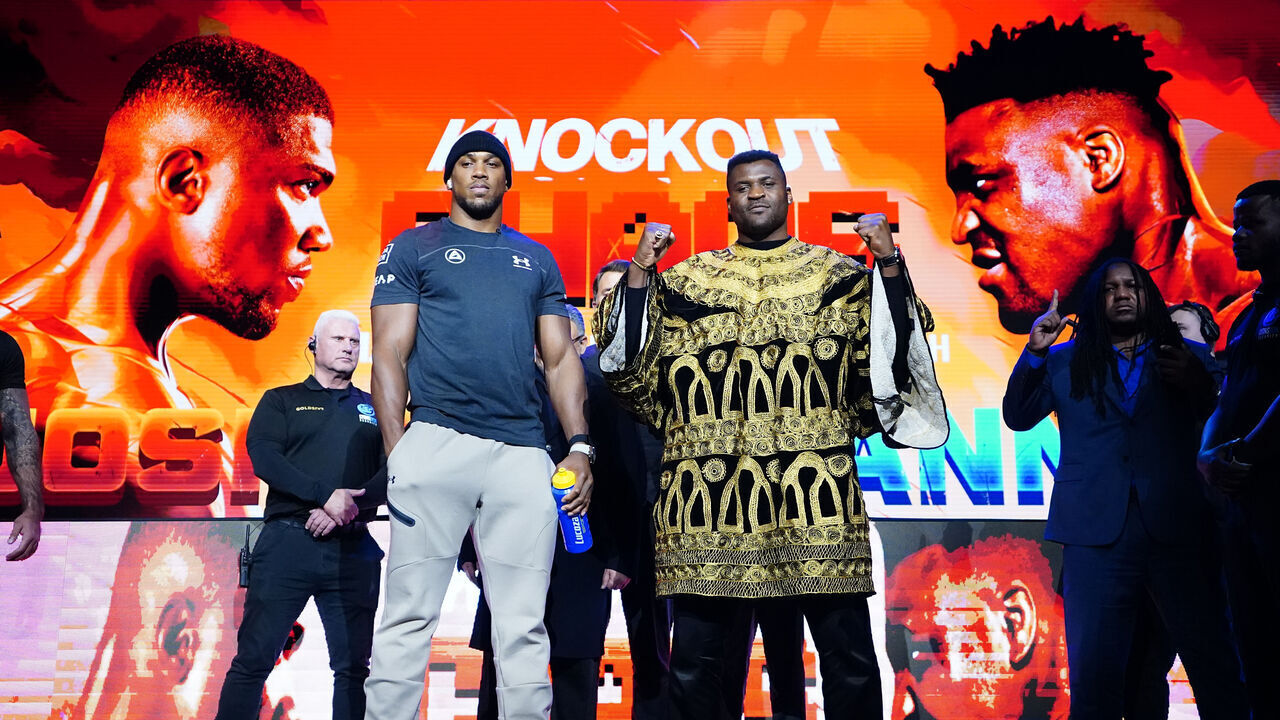 Anthony Joshua and Francis Ngannou during the press conference at HERE at Outernet, London. Picture date: Monday January 15, 2024.