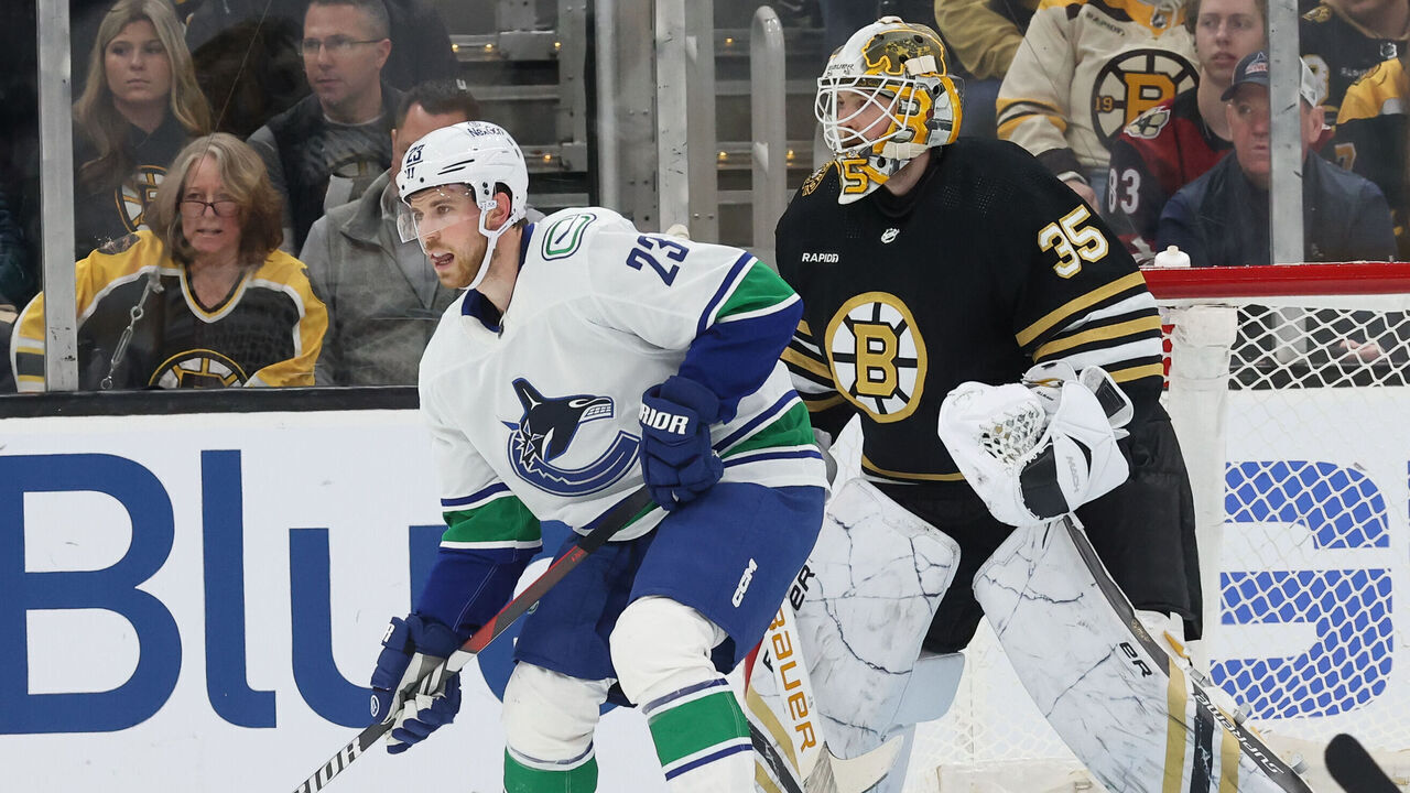 BOSTON, MASSACHUSETTS - FEBRUARY 8: Elias Lindholm #23 of the Vancouver Canucks skates against the Boston Bruins during the first period at the TD Garden on February 8, 2024 in Boston, Massachusetts. The Bruins won 4-0.