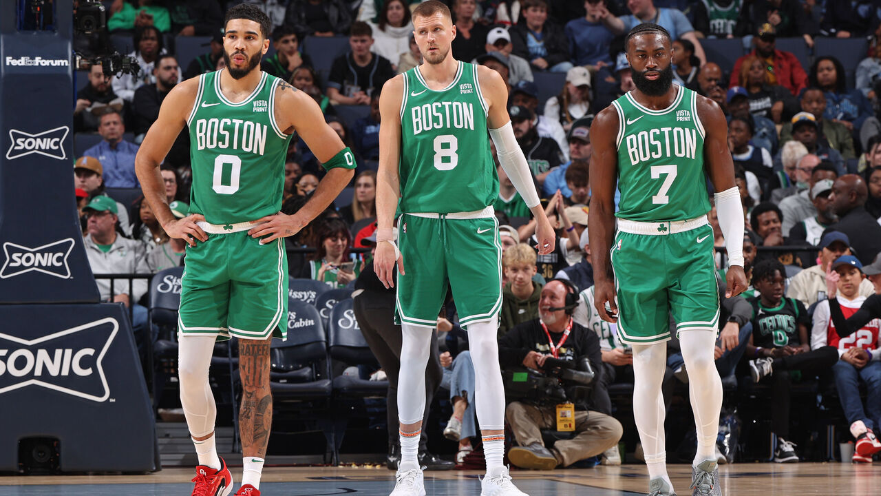 MEMPHIS, TN - NOVEMBER 19: Kristaps Porzingis #8, Jayson Tatum #0, and Jaylen Brown #7 of the Boston Celtics look on during the game against the Memphis Grizzlies on November 19, 2023 at FedExForum in Memphis, Tennessee. Mandatory Copyright Notice: Copyright 2023 NBAE