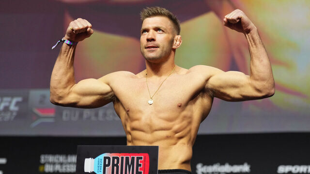 TORONTO, ONTARIO - JANUARY 19: Dricus Du Plessis of South Africa poses on the scale during the UFC 297 ceremonial weigh-in at Scotiabank Arena on January 19, 2024 in Toronto, Ontario.