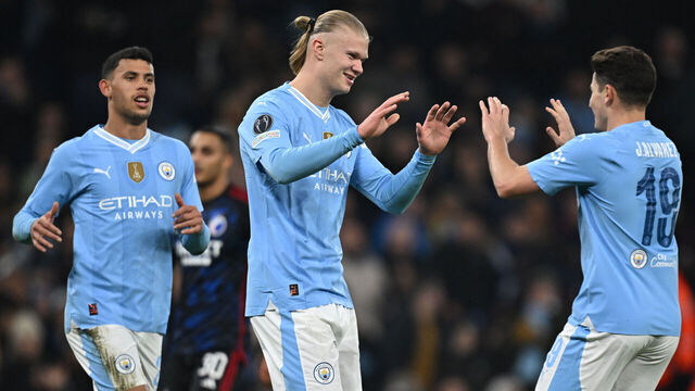 Manchester City's Norwegian striker #09 Erling Haaland (C) celebrates with teammates after scoring their third goal during the UEFA Champions League round of 16, second-leg, football match between Manchester City and FC Copenhagen at the Etihad Stadium, in Manchester, north west England, on March 6, 2024.