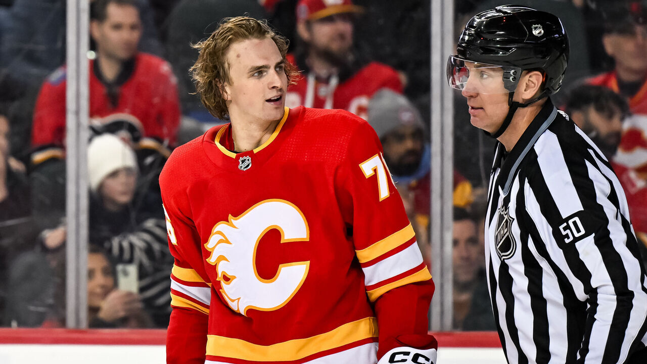 CALGARY, AB - MARCH 04: Calgary Flames Right Wing Martin Pospisil (76) reacts after roughing after a whistle during the third period of an NHL game between the Calgary Flames and the Seattle Kraken on March 4, 2024, at the Scotiabank Saddledome in Calgary, AB.