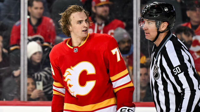 CALGARY, AB - MARCH 04: Calgary Flames Right Wing Martin Pospisil (76) reacts after roughing after a whistle during the third period of an NHL game between the Calgary Flames and the Seattle Kraken on March 4, 2024, at the Scotiabank Saddledome in Calgary, AB.
