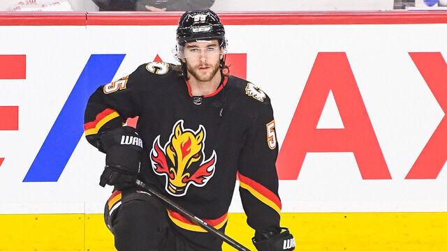 CALGARY, CANADA - JANUARY 27: Noah Hanifin #55 of the Calgary Flames in action against the Chicago Blackhawks during an NHL game at Scotiabank Saddledome on January 27, 2024 in Calgary, Alberta, Canada. The Flames defeated the Blackhawks 1-0.