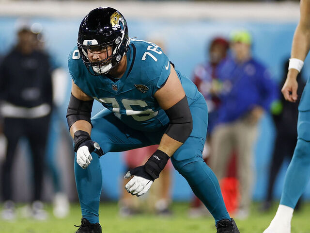 JACKSONVILLE, FL - DECEMBER 17: Jacksonville Jaguars guard Ezra Cleveland (76) lines up for a play during the game between the Jacksonville Jaguars and the Baltimore Ravens on December 17, 2023 at EverBank Stadium in Jacksonville, Fl.