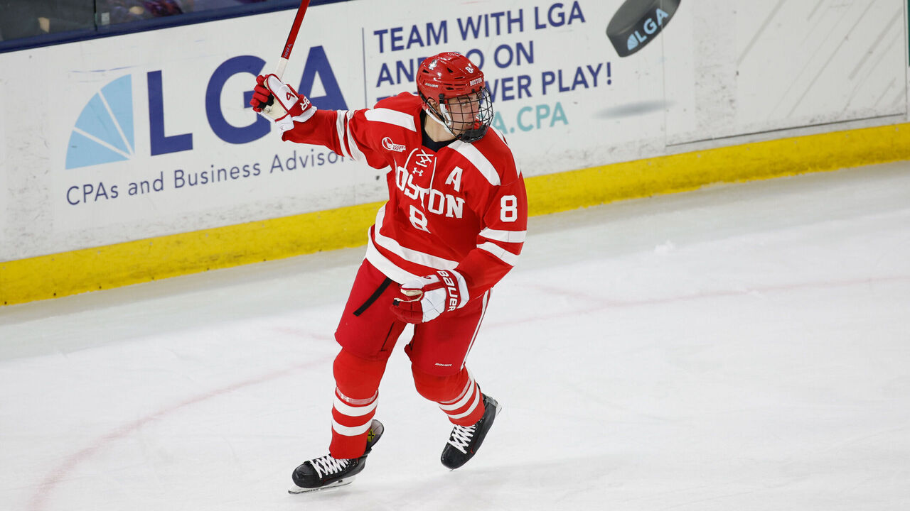 LOWELL, MASSACHUSETTS - NOVEMBER 10: Cade Webber #8 of the Boston University Terriers celebrates a goal by his teammate against the UMass Lowell River Hawks during the third period during NCAA men's hockey at the Tsongas Center on November 10, 2023 in Lowell, Massachusetts. The Terriers won 3-2.