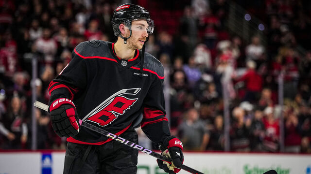 RALEIGH, NORTH CAROLINA - FEBRUARY 08: Michael Bunting #58 of the Carolina Hurricanes reacts after a 5-2 victory against the Colorado Avalanche at PNC Arena on February 08, 2024 in Raleigh, North Carolina.