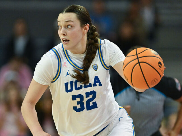 Westwood, CA - February 22:UCLA's Angela Dugalic, #32, drives the ball down court during third quarter action at UCLA's Pauley Pavilion on Thursday, February 22, 2024. The Bruins defeated the Utes 82-52.
