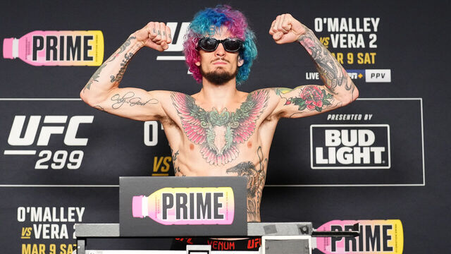 MIAMI, FLORIDA - MARCH 08: Sean O'Malley poses on the scale during the UFC 299 official weigh-in at the Marriott Miami Biscayne Bay on March 08, 2024 in Miami, Florida.