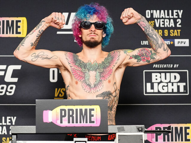 MIAMI, FLORIDA - MARCH 08: Sean O'Malley poses on the scale during the UFC 299 official weigh-in at the Marriott Miami Biscayne Bay on March 08, 2024 in Miami, Florida.