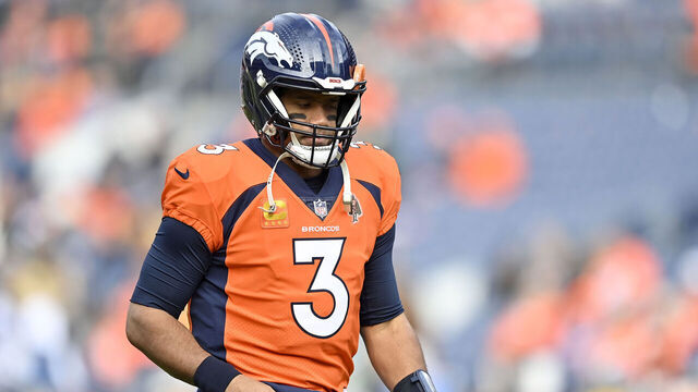 DENVER, COLORADO - DECEMBER 31: Russell Wilson #3 of the Denver Broncos warms up prior to a game against the Los Angeles Chargers at Empower Field At Mile High on December 31, 2023 in Denver, Colorado.