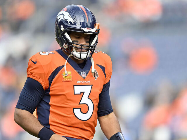 DENVER, COLORADO - DECEMBER 31: Russell Wilson #3 of the Denver Broncos warms up prior to a game against the Los Angeles Chargers at Empower Field At Mile High on December 31, 2023 in Denver, Colorado.