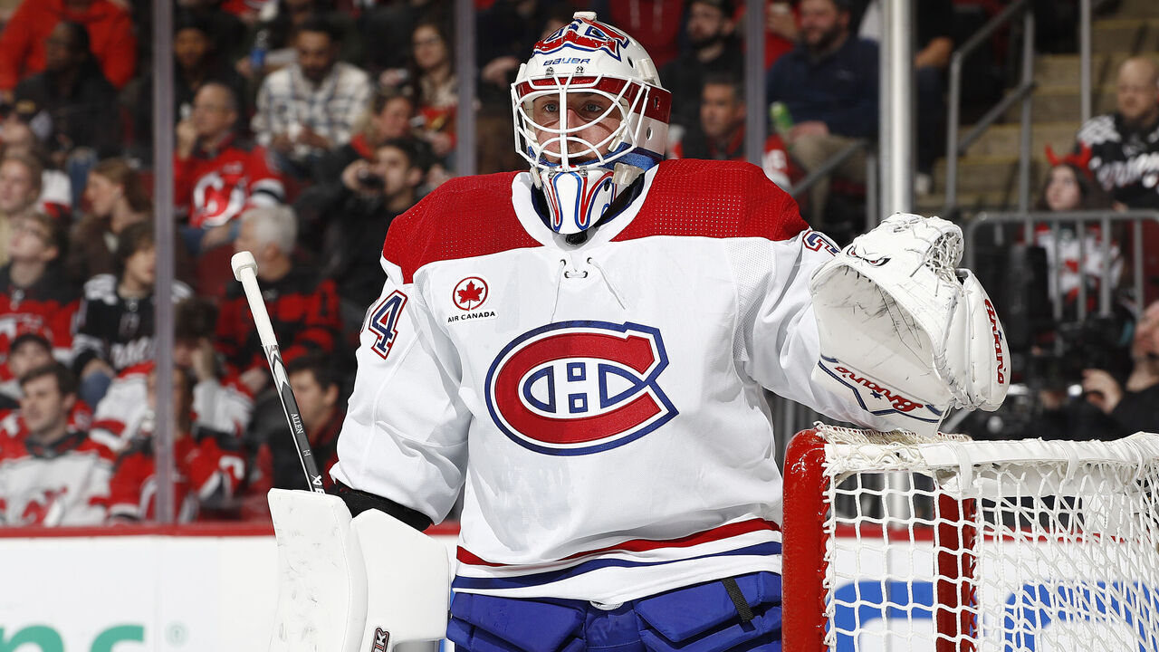 NEWARK, NEW JERSEY - FEBRUARY 24: Jake Allen #34 of the Montreal Canadiens looks on during the second period against the New Jersey Devils at Prudential Center on February 24, 2024 in Newark, New Jersey.