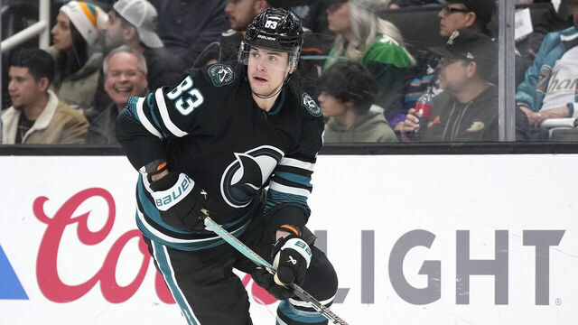 SAN JOSE, CALIFORNIA - FEBRUARY 29: Nikita Okhotiuk #83 of the San Jose Sharks skates with the puck against the Anaheim Ducks in the first period of an NHL hockey game at SAP Center on February 29, 2024 in San Jose, California.
