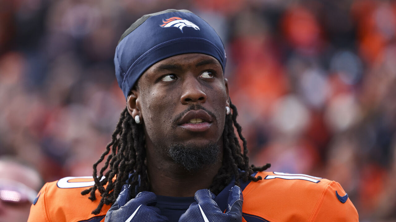 DENVER, CO - DECEMBER 31: Jerry Jeudy #10 of the Denver Broncos looks on from the sideline during the antional anthem prior to an NFL football game against the Los Angeles Chargers at Empower Field at Mile High on December 31, 2023 in Denver, Colorado.