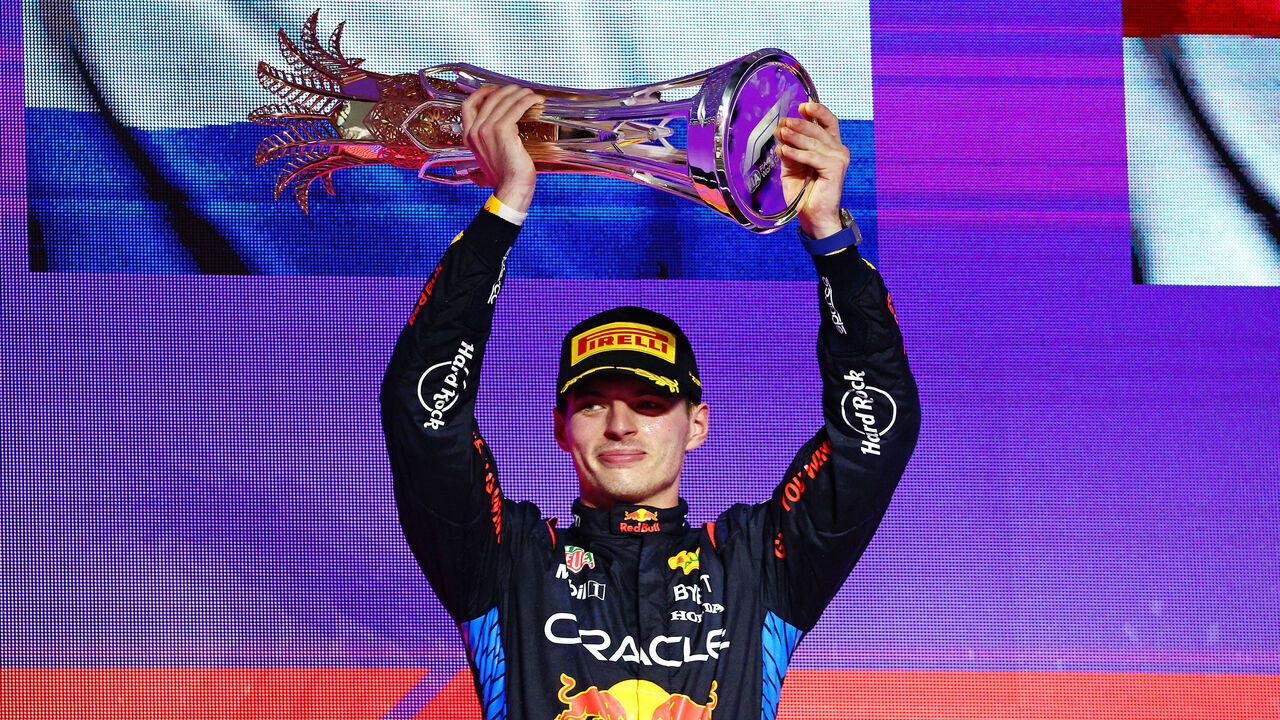 JEDDAH, SAUDI ARABIA - MARCH 09: Race winner Max Verstappen of the Netherlands and Oracle Red Bull Racing celebrates on the podium during the F1 Grand Prix of Saudi Arabia at Jeddah Corniche Circuit on March 09, 2024 in Jeddah, Saudi Arabia.