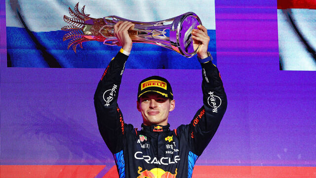 JEDDAH, SAUDI ARABIA - MARCH 09: Race winner Max Verstappen of the Netherlands and Oracle Red Bull Racing celebrates on the podium during the F1 Grand Prix of Saudi Arabia at Jeddah Corniche Circuit on March 09, 2024 in Jeddah, Saudi Arabia.