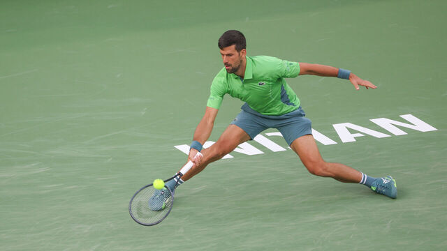 INDIAN WELLS, CA - MARCH 09: Novak Djokovic (SRB) hits a forehand during the BNP Paribas Open on March 9, 2024 at Indian Wells Tennis Garden in Indian Wells, CA.