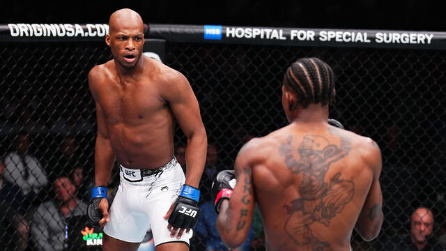 MIAMI, FLORIDA - MARCH 09: (L-R) Michael 'Venom' Page of England battles Kevin Holland in a welterweight fight during the UFC 299 event at Kaseya Center on March 09, 2024 in Miami, Florida.