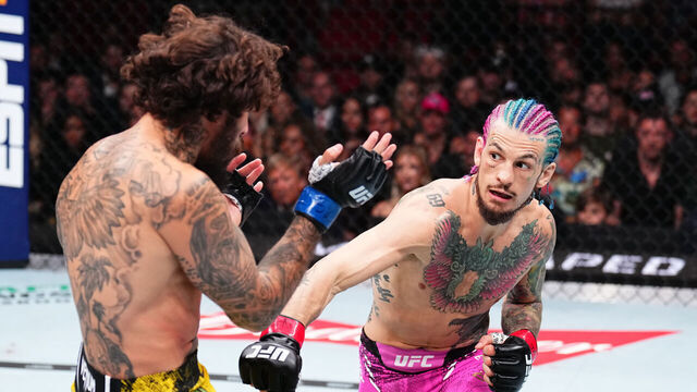MIAMI, FLORIDA - MARCH 09: (R-L) Sean O'Malley punches Marlon Vera of Ecuador in the UFC bantamweight championship fight during the UFC 299 event at Kaseya Center on March 09, 2024 in Miami, Florida.