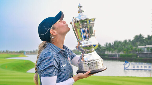 USA's Bailey Tardy celebrates with her trophy after winning the LPGA Blue Bay golf tournament at Jian Lake Blue Bay Golf Club in Sanya in China's southern Hainan province on March 10, 2024.
