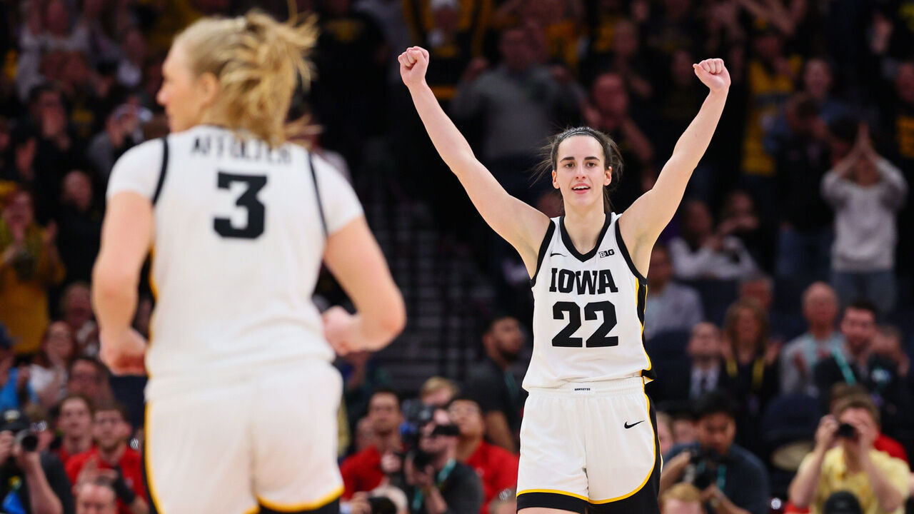 MINNEAPOLIS, MINNESOTA - MARCH 10: Caitlin Clark #22 of the Iowa Hawkeyes celebrates during overtime against the Nebraska Cornhuskers in the Big Ten Women's Basketball Tournament Championship at Target Center on March 10, 2024 in Minneapolis, Minnesota.