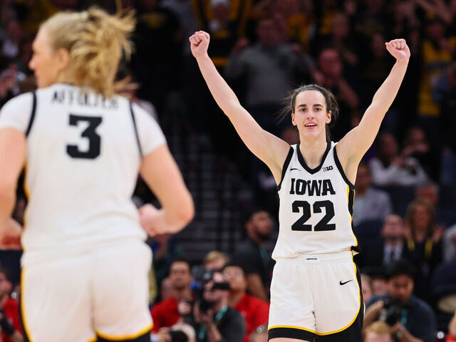 MINNEAPOLIS, MINNESOTA - MARCH 10: Caitlin Clark #22 of the Iowa Hawkeyes celebrates during overtime against the Nebraska Cornhuskers in the Big Ten Women's Basketball Tournament Championship at Target Center on March 10, 2024 in Minneapolis, Minnesota.