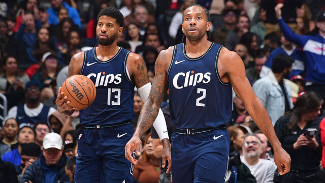 LOS ANGELES, CA - MARCH 1: Paul George #13 and Kawhi Leonard #2 of the LA Clippers looks on during the game against the Washington Wizards on March 1, 2024 at Crypto.Com Arena in Los Angeles, California. NOTE TO USER: User expressly acknowledges and agrees that, by downloading and/or using this Photograph, user is consenting to the terms and conditions of the Getty Images License Agreement. Mandatory Copyright Notice: Copyright 2024 NBAE