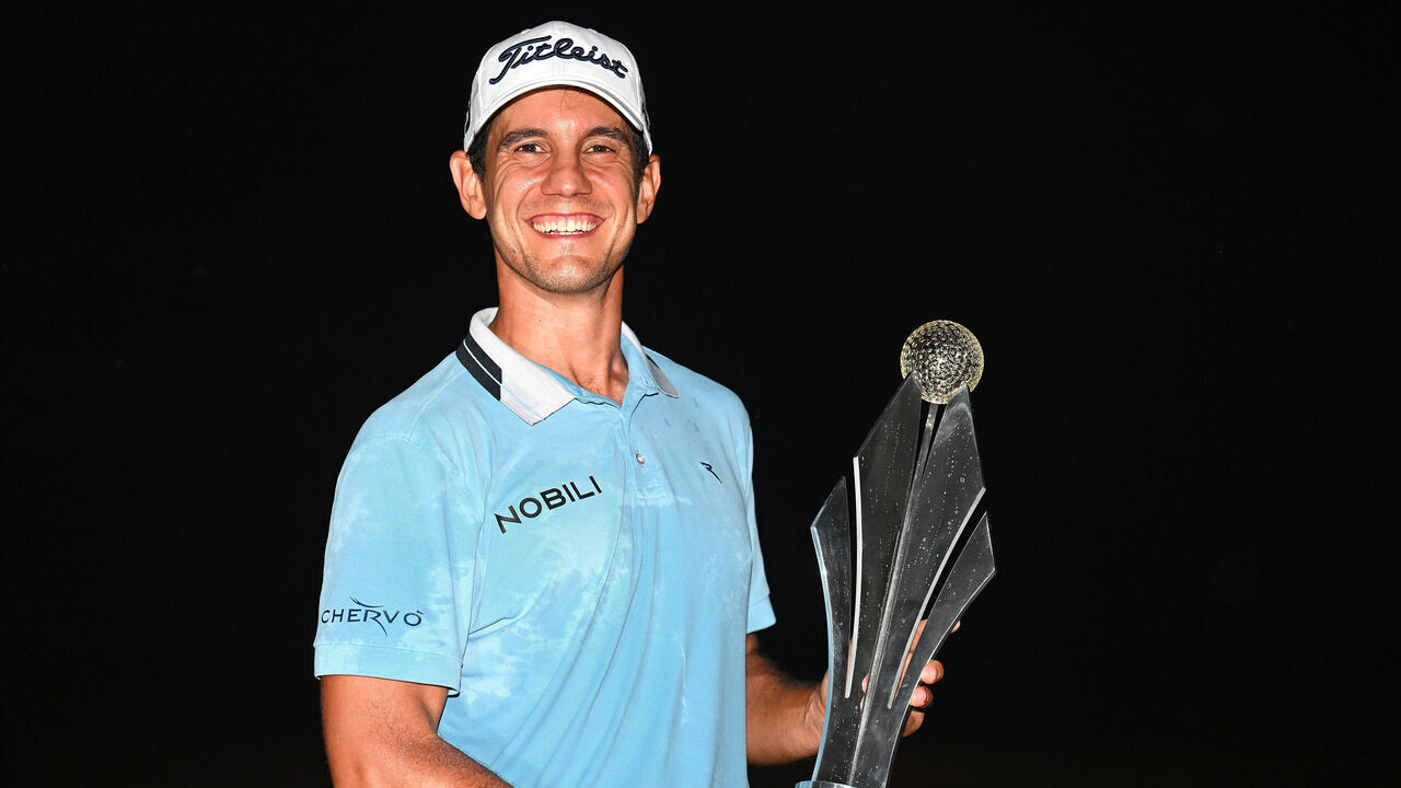 JOHANNESBURG, SOUTH AFRICA - MARCH 10: Matteo Manassero of Italy is awarded the trophy as he celebrates victory following day four of the Jonsson Workwear Open at Glendower Golf Club on March 10, 2024 in Johannesburg, South Africa.