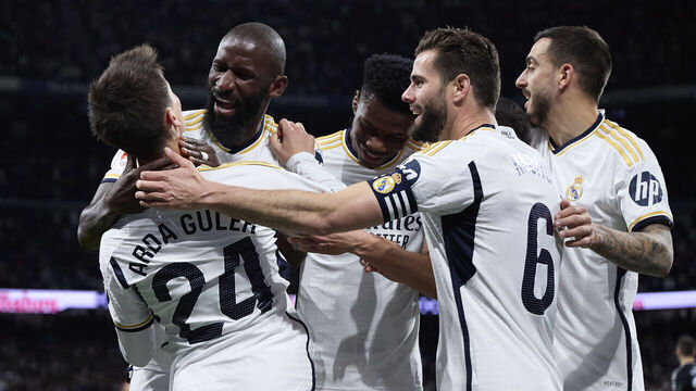 MADRID, SPAIN - MARCH 10: Arda Guler of Real Madrid celebrates after scoring their side's fourth goal with his teammates during the LaLiga EA Sports match between Real Madrid CF and Celta Vigo at Estadio Santiago Bernabeu on March 10, 2024 in Madrid, Spain.