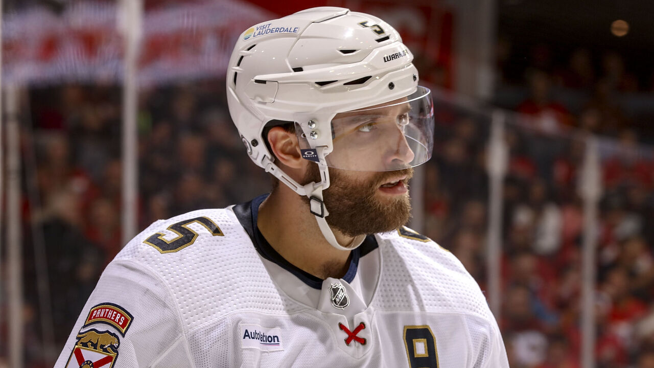 CALGARY, AB - DECEMBER 18: Aaron Ekblad #5 of the Florida Panthers skates between whistles against the Calgary Flames at Scotiabank Saddledome on December 18, 2023 in Calgary, Alberta, Canada.