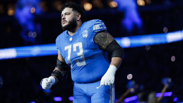 DETROIT, MICHIGAN - DECEMBER 16: Jonah Jackson #73 of the Detroit Lions runs onto the field during player introductions before an NFL football game against the Denver Broncos at Ford Field on December 16, 2023 in Detroit, Michigan.