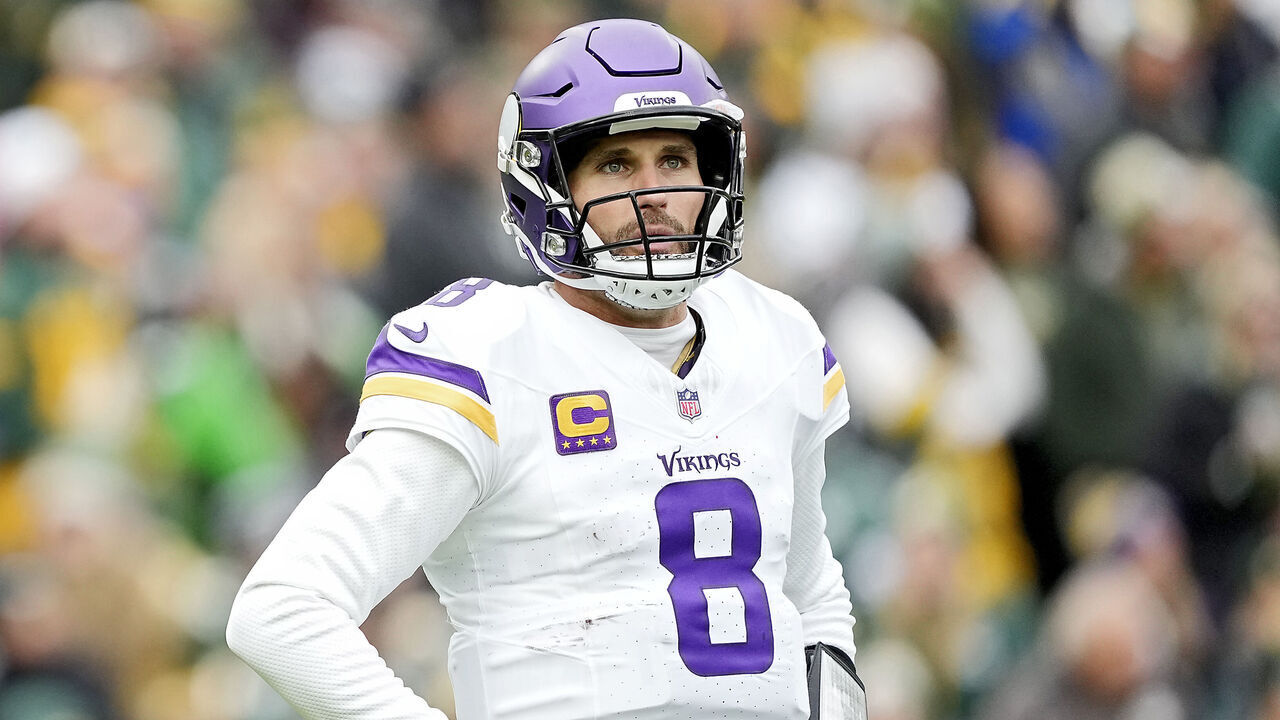 GREEN BAY, WISCONSIN - OCTOBER 29: Kirk Cousins #8 of the Minnesota Vikings looks on during the first half of a game against the Green Bay Packers at Lambeau Field on October 29, 2023 in Green Bay, Wisconsin.
