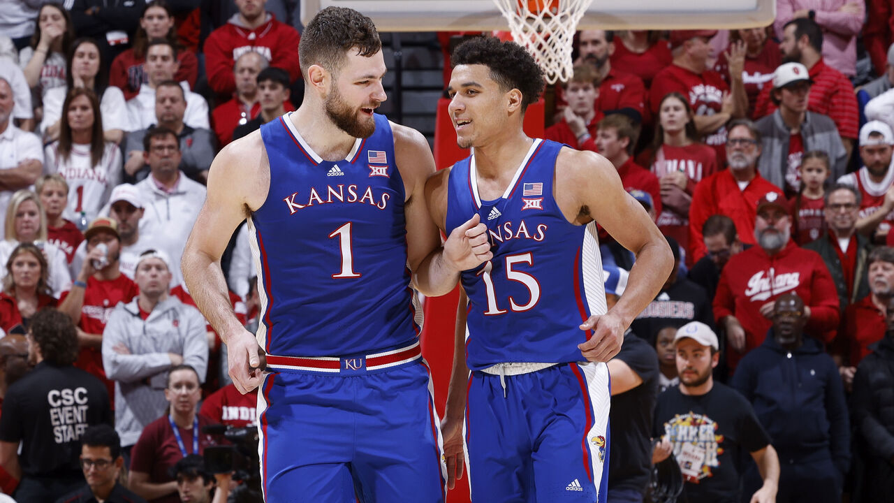 BLOOMINGTON, IN - DECEMBER 16: Kansas Jayhawks center Hunter Dickinson (1) and guard Kevin McCullar Jr. (15) celebrate during a college basketball game against the Indiana Hoosiers on December 16, 2023 at Simon Skjodt Assembly Hall in Bloomington, Indiana.