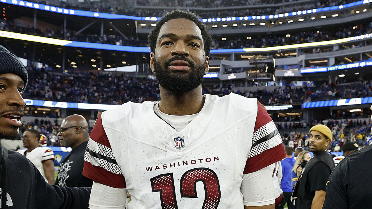 INGLEWOOD, CALIFORNIA - DECEMBER 17: Jacoby Brissett #12 of the Washington Commanders reacts after the game against the Los Angeles Rams at SoFi Stadium on December 17, 2023 in Inglewood, California.