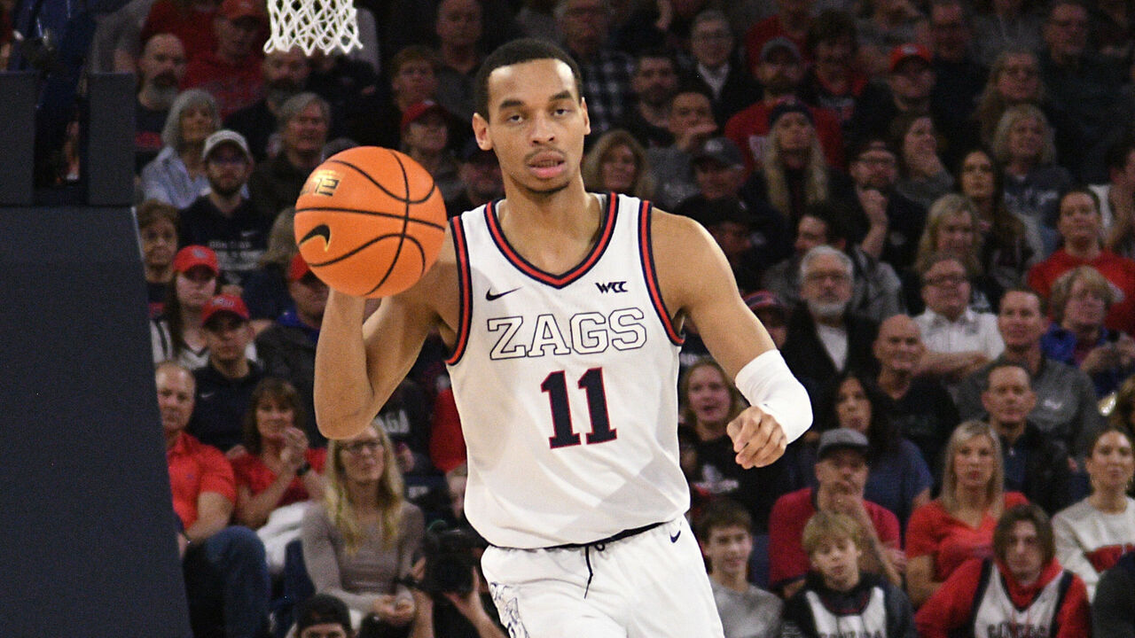 SPOKANE, WA - FEBRUARY 24: Nolan Hickman #11 of the Gonzaga Bulldogs brings the ball up court during the second half of the game between the Gonzaga Bulldogs and the Santa Clara Broncos at McCarthey Athletic Center on February 24, 2024 in Spokane, Washington.