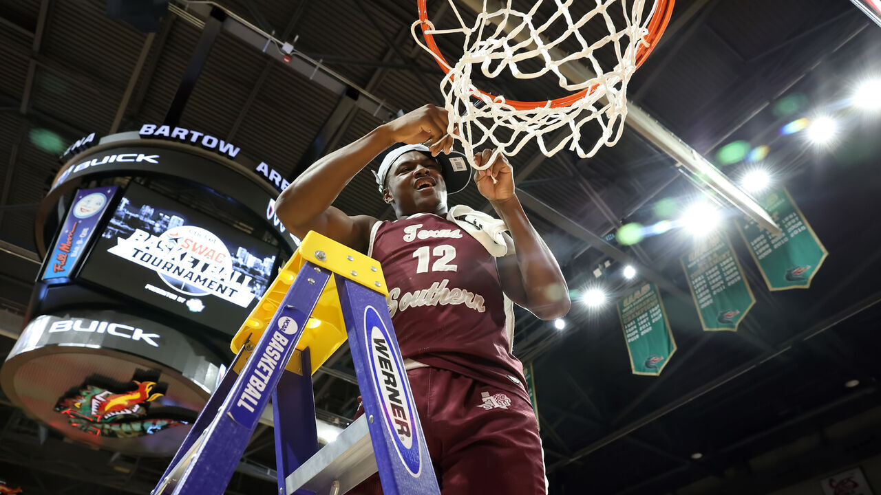 BIRMINGHAM, AL - MARCH 11: Texas Southern Tigers guard Zytarious Mortle (12) cuts down the net after the SWAC Basketball Championship game between the Texas Southern Tigers and the Grambling State Tigers on March 11, 2023 at Bartow Arena in Birmingham, Alabama.