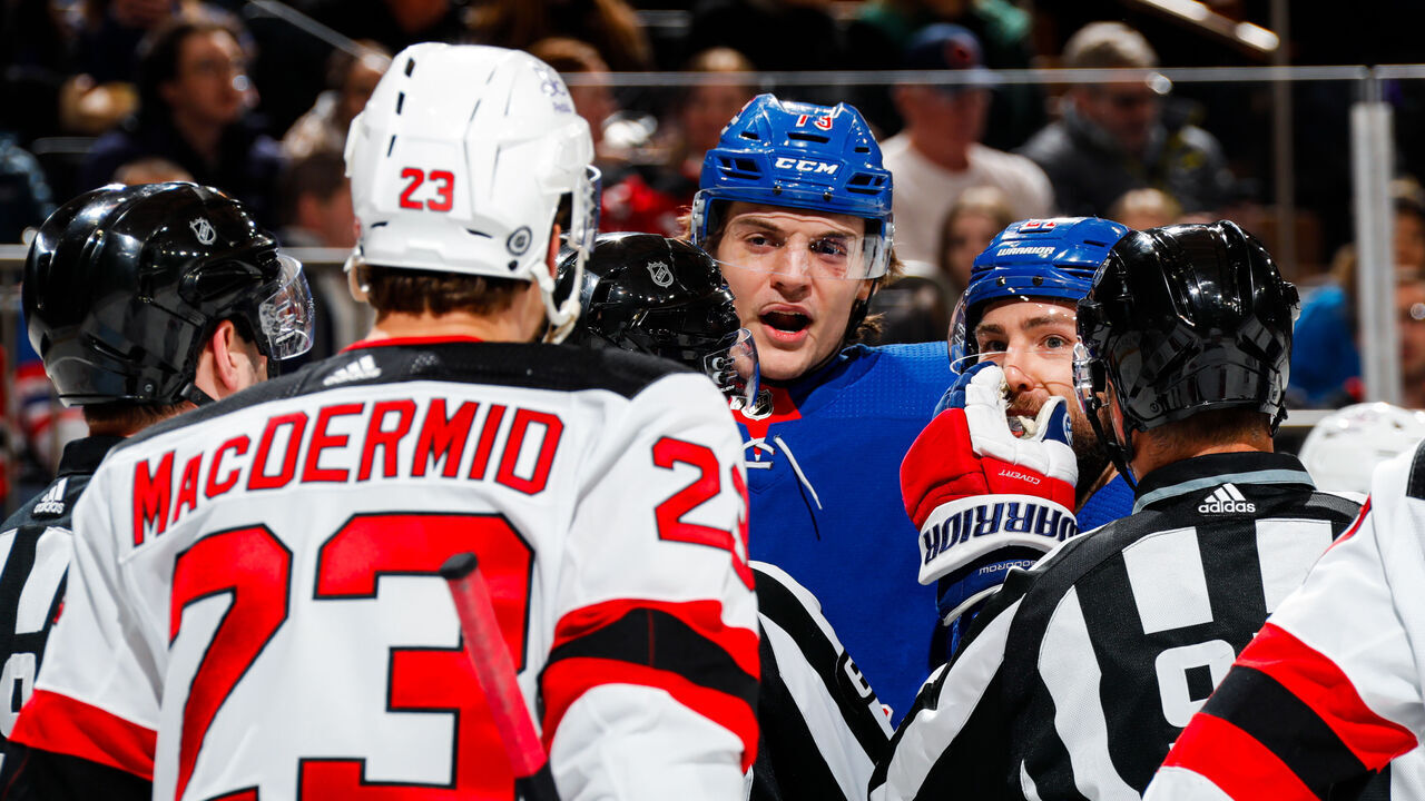 NEW YORK, NEW YORK - MARCH 11: Matt Rempe #73 of the New York Rangers exchanges words with Kurtis MacDermid #23 of the New Jersey Devils at Madison Square Garden on March 11, 2024 in New York City.