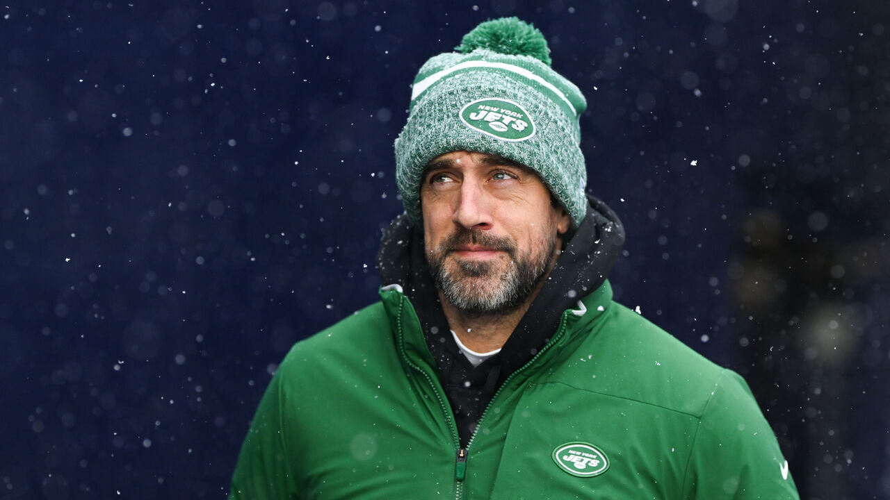FOXBOROUGH, MA - JANUARY 7: Aaron Rodgers #8 of the New York Jets runs onto the field prior to the start of the game against the New England Patriots at Gillette Stadium on January 7, 2024 in Foxborough, Massachusetts.