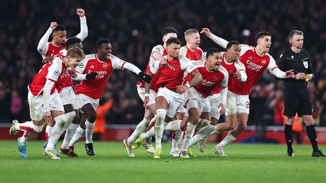 LONDON, ENGLAND - MARCH 12: Players of Arsenal celebrate winning the penalty shoot out during the UEFA Champions League 2023/24 round of 16 second leg match between Arsenal FC and FC Porto at Emirates Stadium on March 12, 2024 in London, England.