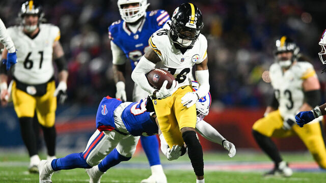ORCHARD PARK, NY - JANUARY 15: Diontae Johnson #18 of the Pittsburgh Steelers runs with the football during the second half of the NFL wild-card playoff football game against the Buffalo Bills at Highmark Stadium on January 15, 2024 in Orchard Park, New York.