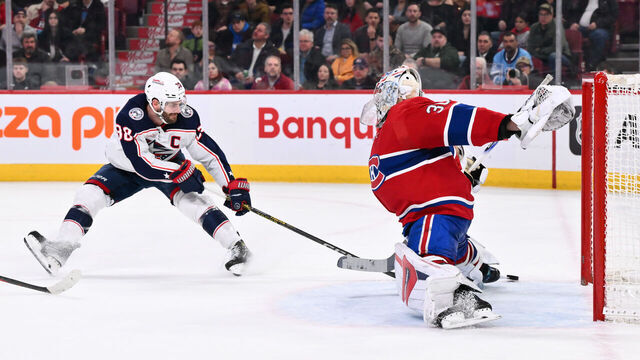 MONTREAL, CANADA - MARCH 12: Goaltender Cayden Primeau #30 of the Montreal Canadiens makes a save on Boone Jenner #38 of the Columbus Blue Jackets during the third period at the Bell Centre on March 12, 2024 in Montreal, Quebec, Canada. The Montreal Canadiens defeated the Columbus Blue Jackets 3-0.