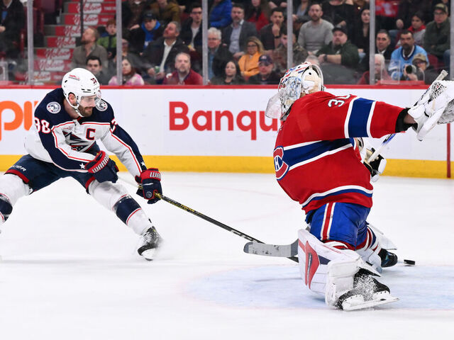 MONTREAL, CANADA - MARCH 12: Goaltender Cayden Primeau #30 of the Montreal Canadiens makes a save on Boone Jenner #38 of the Columbus Blue Jackets during the third period at the Bell Centre on March 12, 2024 in Montreal, Quebec, Canada. The Montreal Canadiens defeated the Columbus Blue Jackets 3-0.